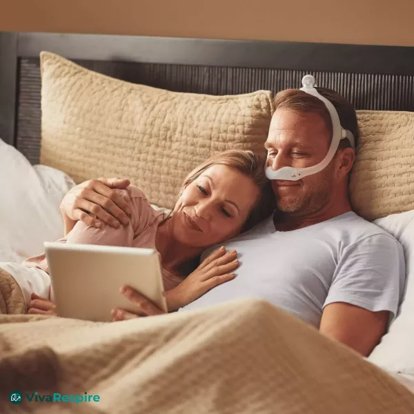 Philips DreamWear nasal CPAP mask with top-of-head hose connection – open field of vision while reading in bed
