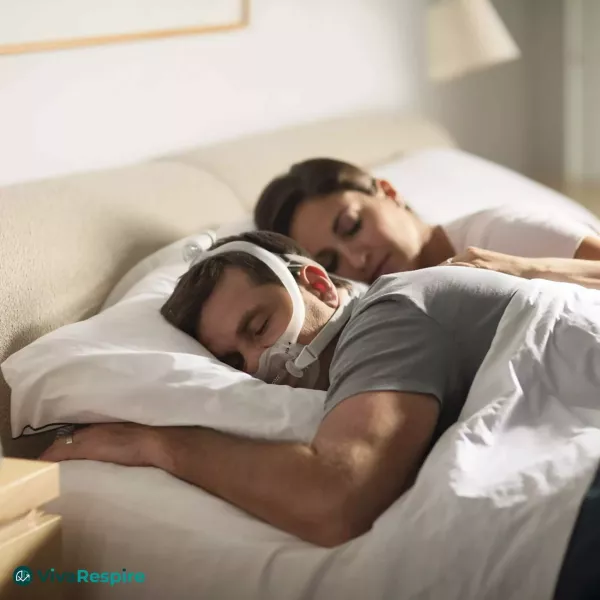 Patient dormant avec masque CPAP DreamWear Full Face